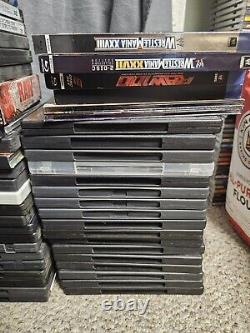 Lot of WWE/WWF DVDs + More. 96 Individual Titles. TNA. ROH. JCW. Royal Rumble