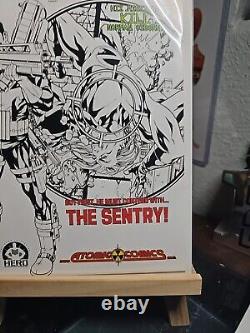 Punisher 1 Cover & Art Jerome Opena Atomic Comics Exclusive Hero Initiative